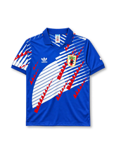 Japan 1994-95 home jersey in blue with diagonal wing graphic and JFA crest
