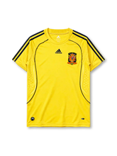 Spain 2008 away jersey in yellow with navy trim and Spanish federation crest
