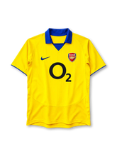 Arsenal 2003-04 away jersey in yellow with blue collar and O2 sponsor logo