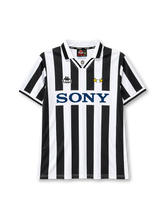 Juventus 1995-97 home jersey, front view, black and white vertical stripes, white polo collar with black tipping, small Juventus crest at collar insert, Kappa logo on right chest, two gold stars on left chest, navy SONY sponsor logo on white chest band, white cuffs with black trim