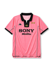 Juventus 1997-98 away jersey, front view, pink body, black polo collar with white V-notch, yellow centenary 100 emblem on collar insert, Kappa logo on right chest, two gold stars on left chest, black SONY MiniDisc sponsor logo, mesh side panels with black and white piping, black cuffs, split side vents