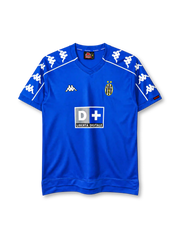 Juventus 1999-00 away jersey, front view, royal blue body, V-neck collar, repeating white Kappa logo bands on shoulders and sleeves with white piping, Kappa logo on right chest, oval Juventus crest with two gold stars on left chest, D+ Liberta Digitale sponsor logo, red Kappa tab on left cuff, stepped hem