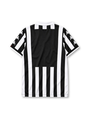 Juventus 1999-00 home jersey, front view, black and white vertical stripes, white polo collar with black V insert, repeating white Kappa logos on black sleeve panels, Kappa logo on right chest, oval Juventus crest with two gold stars on left chest, D+ Liberta Digitale sponsor logo, white cuffs with black trim, split side vents
