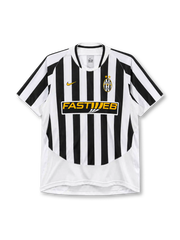 Juventus 2003-04 home jersey, front view, black and white vertical stripes, round crew neck with black and white trim, gold Nike swoosh on right chest, oval Juventus crest with two gold stars on left chest, yellow FASTWEB sponsor logo on black band, plain white lower body panel, white cuffs