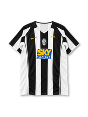 Juventus 2004-05 home jersey, front view, wide black and white vertical stripes, V-neck collar with black trim, yellow Nike swoosh on right chest, centred oval Juventus crest, two gold stars on left chest, blue SKY SPORT sponsor logo, curved black side piping, white cuffs with black edging