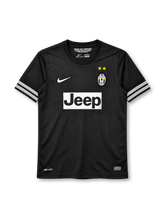 Juventus 2012-13 away jersey, front view, all-black body, black crew neck collar, white stripe bands on both sleeves, white Nike swoosh on right chest, oval Juventus crest with two gold stars on left chest, white JEEP sponsor panel, DRI-FIT print and Nike Authentic tag at hem