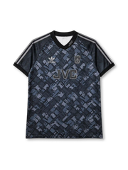 Arsenal 1990-92 away jersey, front view, dark charcoal body with diagonal blue-grey abstract pattern, black V-neck collar with AFC script, black sleeves with three grey stripes, grey adidas trefoil logo on right chest, monochrome Arsenal cannon crest on left chest, JVC sponsor lettering, black ribbed cuffs