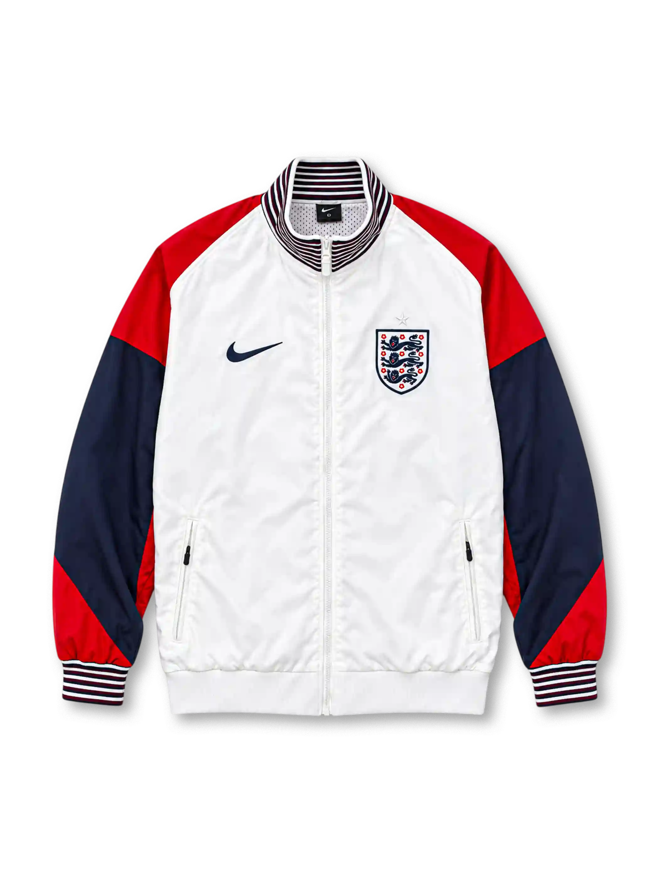 Front view of the England 2024/25 Nike Strike Anthem Jacket featuring a white body, red shoulders, navy sleeves, striped stand collar and cuffs, dark Nike Swoosh, Three Lions crest, full zipper, and zippered pockets.
