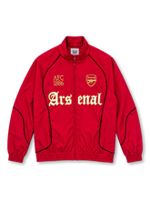 Front view of the dark red Arsenal FC graphic mock-neck jacket featuring gold AFC 1886 lettering, a gold Arsenal crest, large white and gold Gothic-style Arsenal typography, black curved piping, a stand-up collar, full zipper, and elasticated cuffs.
