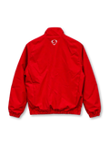 Front view of the Manchester United 2009/10 Nike red track jacket featuring a curved black chest stripe, white Nike Swoosh, Manchester United club crest, AIG sponsor logo, high collar, full-length front zipper, and two zippered pockets.