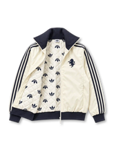 Front view of an off-white adidas Originals Juventus 2024-25 track jacket featuring a black stand-up collar, three black shoulder stripes, a black Trefoil logo, a monochrome vintage zebra crest, full-length front zipper, and dark ribbed cuffs and hem.