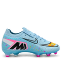 Nike Mercurial FG soccer cleats in light blue with multicolor confetti speckles, a black-outlined silver Swoosh, an orange painted toe graphic, an oversized M heel logo, and pink-tipped studs, shown as a pair.