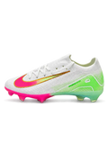 Nike Mercurial FG soccer cleats in white with a lime green heel fade, a gold-outlined Swoosh fading from green to pink, and an iridescent pink and gold FG soleplate, shown from the lateral side and outsole.