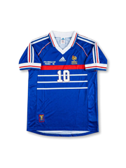Front view of France 1998 World Cup home shirt in blue with white chest stripes, red chest band, tournament print, and number 10 on the front.