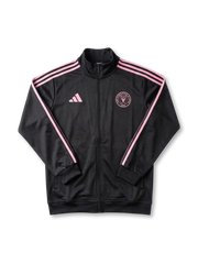 Inter Miami CF adidas track jacket in black with pink Three Stripes on sleeves, pink adidas logo at left chest, tonal pink circular Inter Miami CF crest at right chest, ribbed collar and cuffs, twin zip pockets