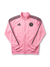 Inter Miami CF adidas track jacket in pink with black Three Stripes on sleeves, black adidas logo at left chest, tonal black circular Inter Miami CF crest at right chest, ribbed collar and cuffs