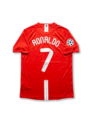 Front view of Manchester United 2008 Champions League Final home shirt in red with AIG sponsor, club crest, Moscow final embroidery, and Champions League sleeve patch.