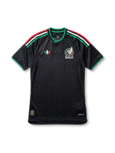 Mexico national team adidas 2026 World Cup Authentic (Player Issue) second away jersey in black with tonal Aztec geometric jacquard, tricolor green-white-red Three Stripes, tricolor Trefoil at left chest, FMF eagle crest at right chest, green collar and cuffs