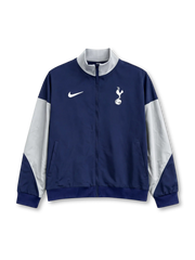 Tottenham Hotspur Nike track jacket in navy with white raglan sleeve panels, white stand collar, Nike Swoosh at left chest, embroidered cockerel crest at right chest