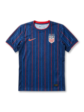 USA national team Nike 2025/26 World Cup Authentic (Player Issue) away jersey in navy with alternating red and blue vertical pinstripes, four-star USA shield crest in white at right chest, red Swoosh at left chest, red crew collar and sleeve cuff bands