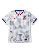 USA national team Nike 2025/26 World Cup away jersey in navy with alternating red and blue vertical pinstripes, red crew collar with white inner trim, red Swoosh at left chest, USA shield crest in white at right chest, red sleeve cuff bands