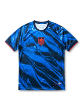 USA national team Nike 2028 Los Angeles Olympics Special Edition Authentic (Player Issue) jersey with royal blue and navy tie-dye marble allover print, red alternate star-shield crest at left chest, navy crew collar, red sleeve cuff bands, LA 2028 tournament designation at lower hem