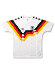 Front view of West Germany 1990 World Cup home retro shirt in white with black, red, and gold chest graphic, classic crest, and adidas detailing.