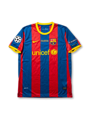 Front view of Barcelona 2011 Champions League Final home shirt in red and blue stripes with UNICEF sponsor, London final embroidery, club crest, and Champions League sleeve patch.