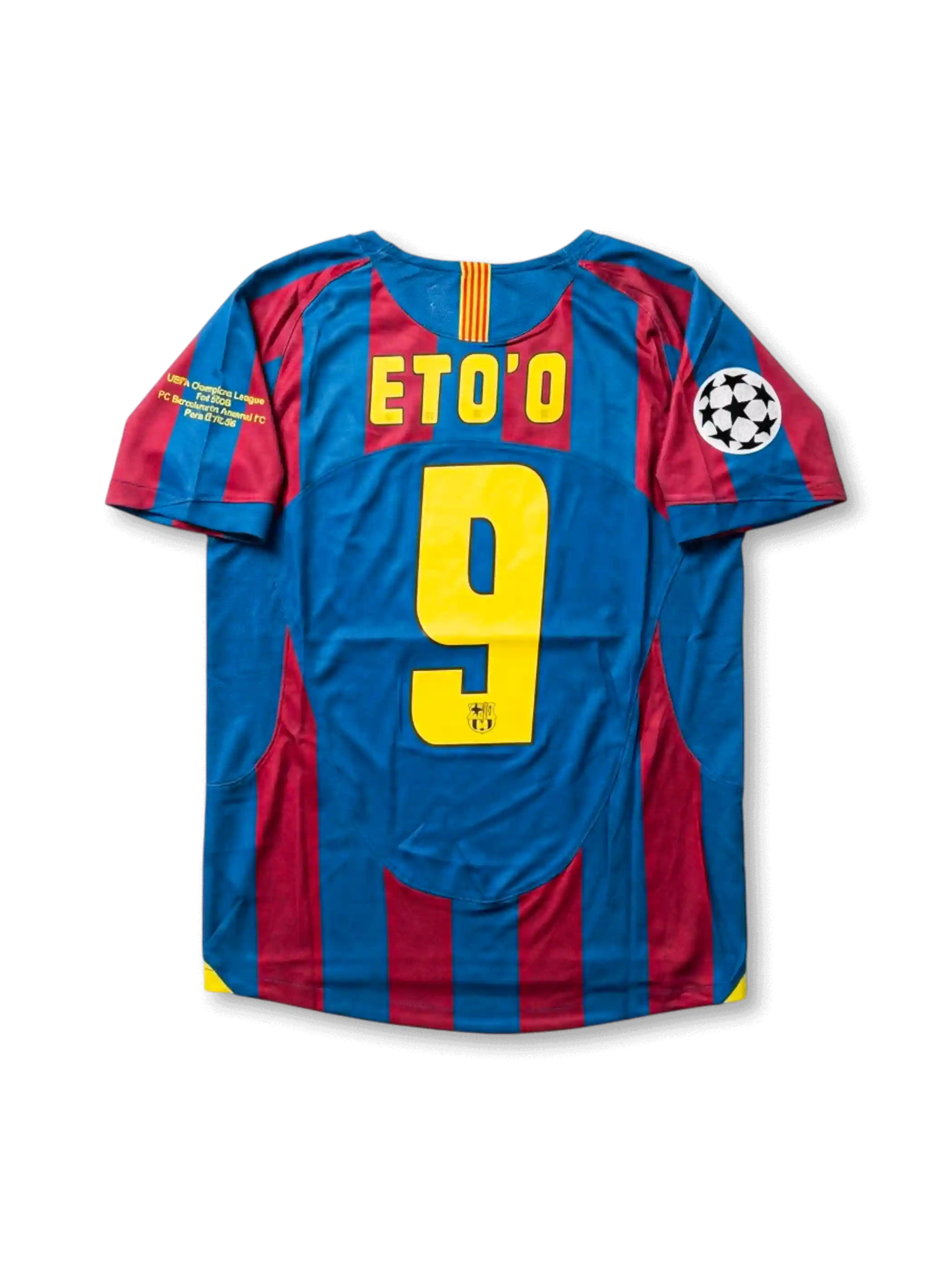 Front view of Barcelona 2005-06 Paris Final home shirt with blaugrana stripes, club crest, yellow detailing, Champions League patch, and final sleeve embroidery.