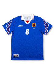 Front view of Japan 1997-98 home shirt with blue body, flame sleeve graphics, JFA crest, and #8 front number.