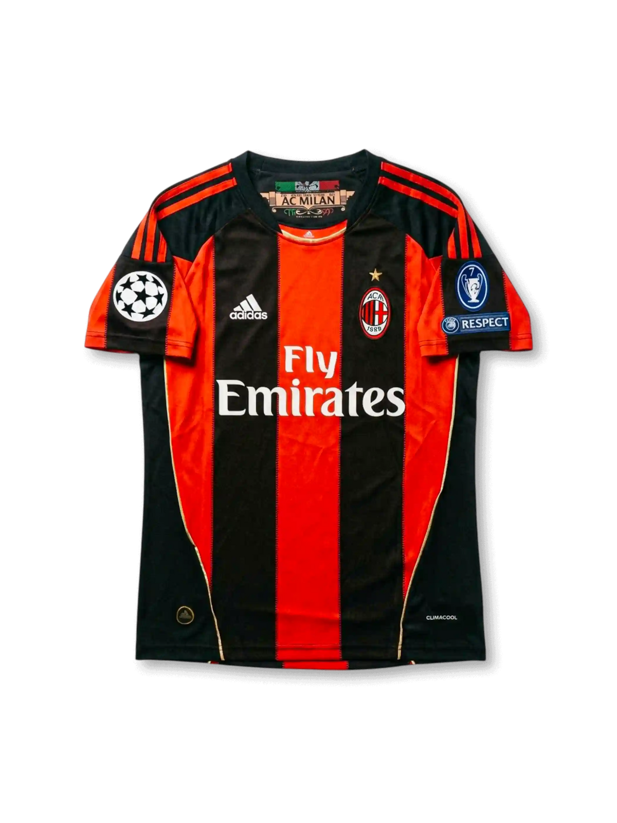Front view of AC Milan 2010-11 Champions League home shirt with red and black stripes, Fly Emirates sponsor, AC Milan crest, and UEFA sleeve patches.