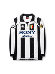 Front view of Juventus 1997-98 Champions League home long sleeve shirt with black and white stripes, Sony MiniDisc sponsor, Juventus crest, Scudetto shield, and UEFA sleeve patch.