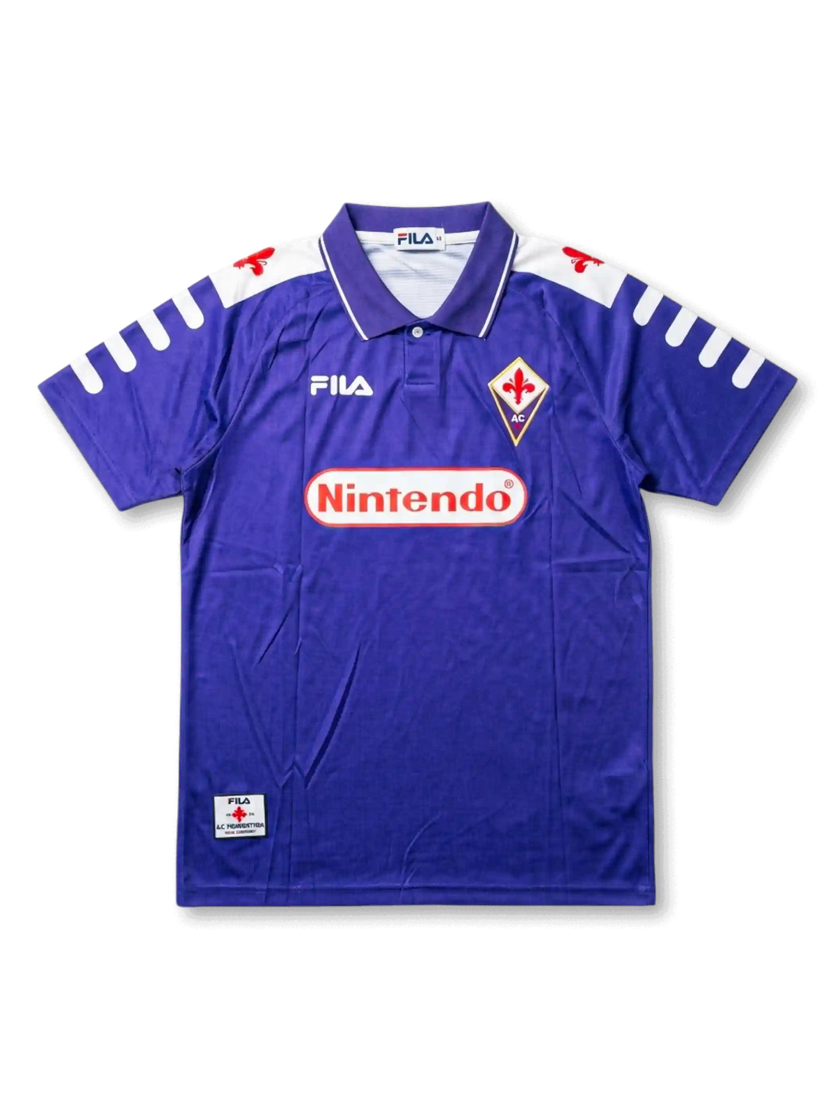 Front view of Fiorentina 1998-99 home shirt with purple body, Nintendo sponsor, Fiorentina crest, Fila logo, and white shoulder detailing.