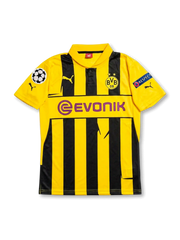 Front view of Borussia Dortmund 2012-13 Champions League home shirt with yellow and black stripes, Evonik sponsor, BVB crest, and European sleeve patches.
