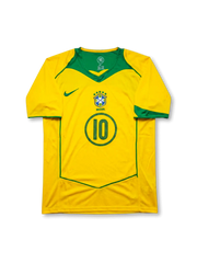 Front view of Brazil 2004 home jersey with yellow body, green chest panel, Brazil crest, and #10 front number detail.