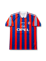 Front view of Bayern Munich 1995-97 home jersey with red and blue vertical stripes, OPEL sponsor, white collar, and club crest.