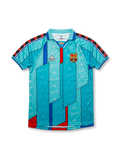Front view of Barcelona 1996-97 away jersey in turquoise with geometric red and blue design, club crest, Kappa logo, and collar detail.