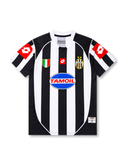Front view of Juventus 2002-03 home jersey with black-and-white stripes, Tamoil sponsor, Scudetto shield, two-star crest, and red sleeve panels.