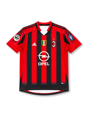 Front view of AC Milan 1999-00 home jersey with red and black stripes, Opel sponsor, Scudetto shield, club crest, and sleeve patches.