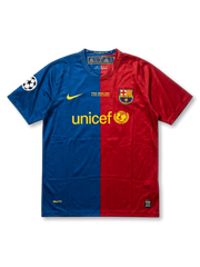 Front view of Barcelona 2009 Rome Final shirt with blue and red half-and-half design, club crest, Unicef sponsor, Rome final embroidery, and Champions League sleeve patch.