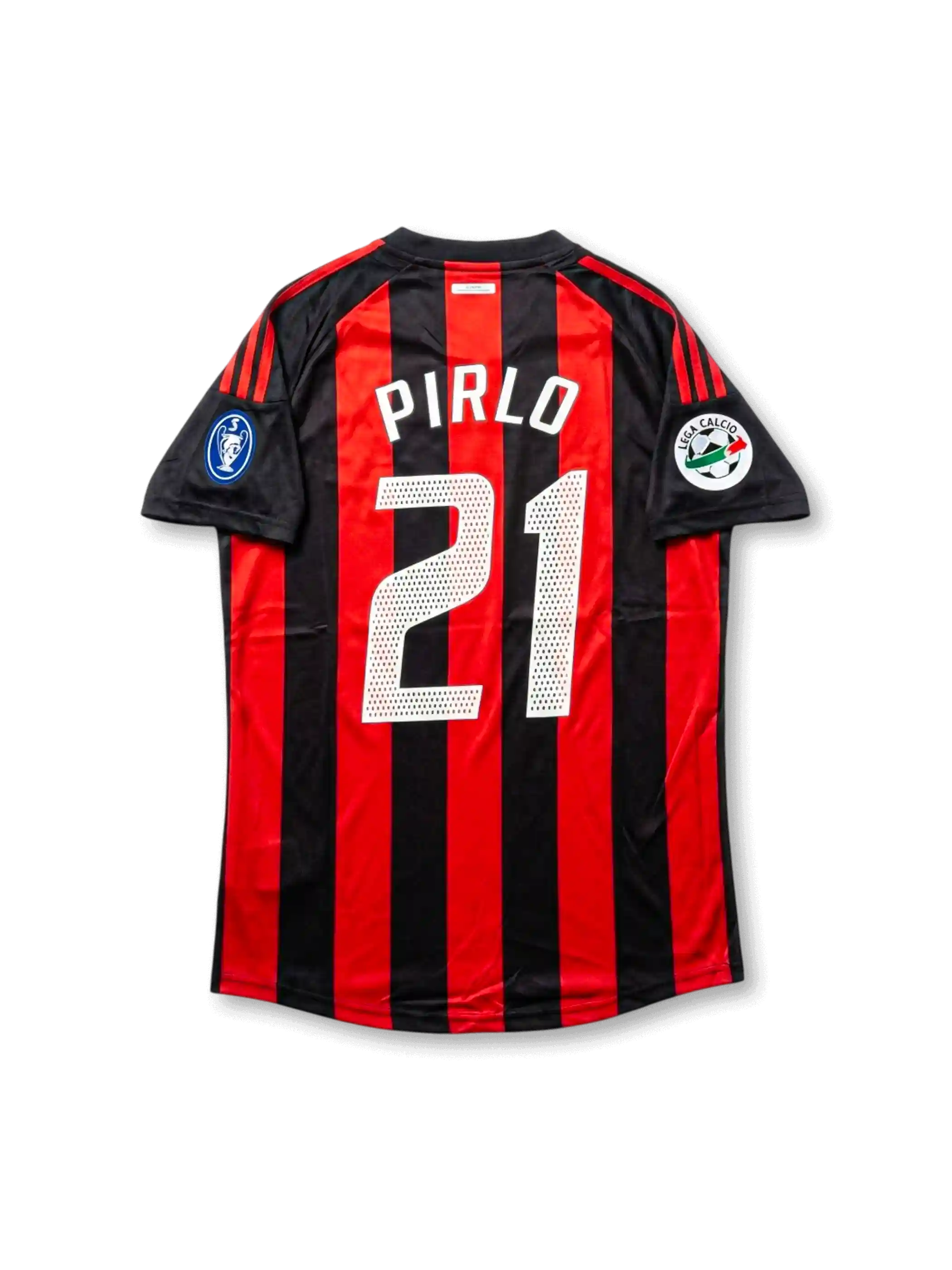Back view of AC Milan Pirlo #21 legacy edition shirt with red and black stripes, white player printing, black sleeve panels, and sleeve patch detailing.