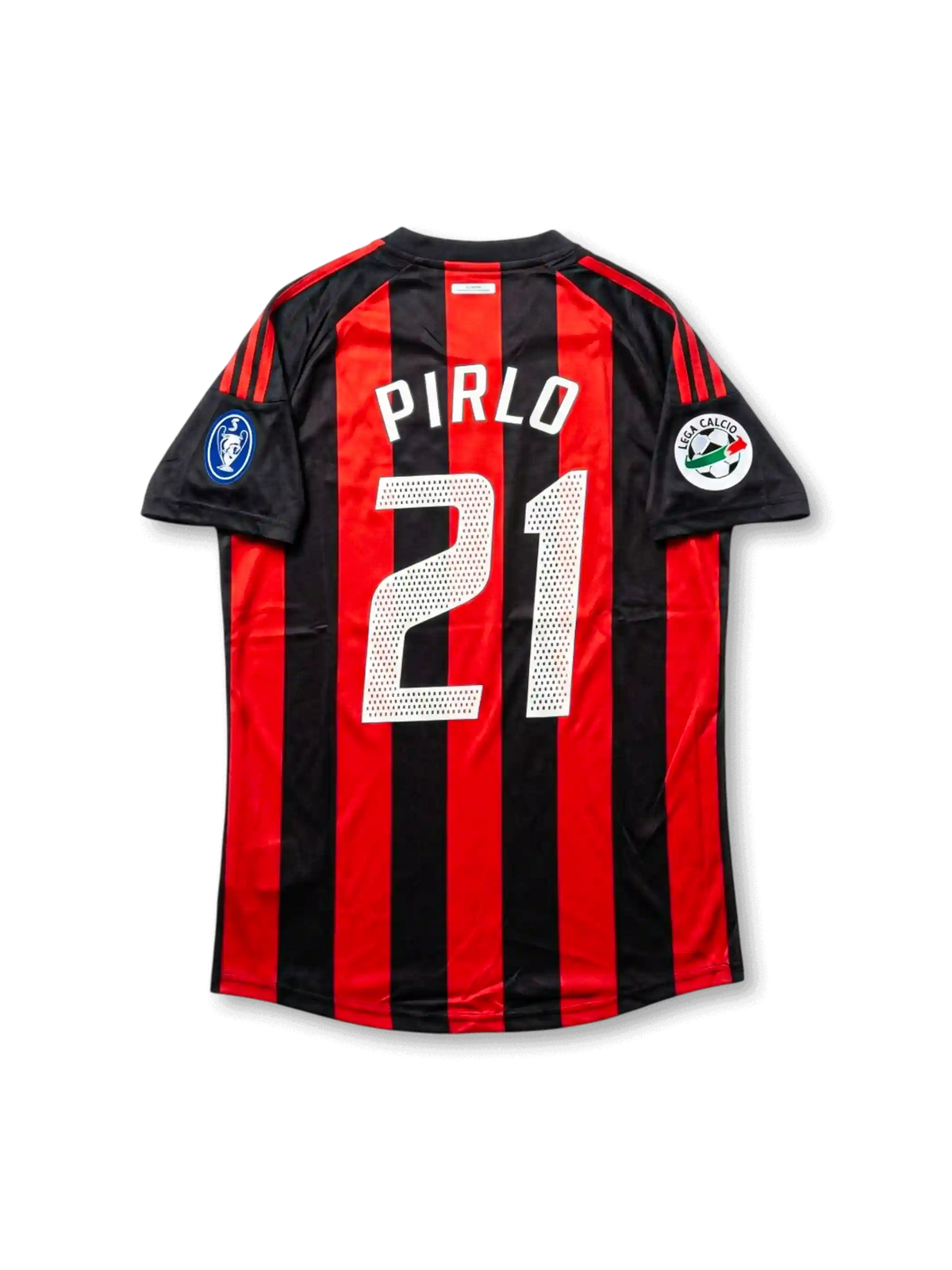 Back view of AC Milan Pirlo #21 legacy edition shirt with red and black stripes, white player printing, black sleeve panels, and sleeve patch detailing.