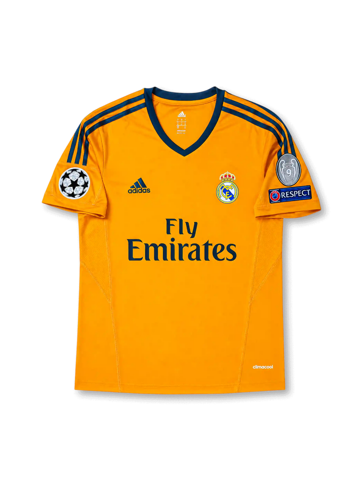 Front view of Real Madrid 2013-14 third shirt with orange base, Real Madrid crest, Fly Emirates sponsor, dark grey trim, and Champions League sleeve patch detailing.