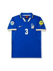 Front view of Italy 1996 home shirt with blue base, Italy crest, central #3 print, fold collar, yellow trim, and tournament sleeve patch detailing.