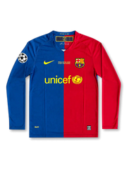 front view of Barcelona 2009 Rome Final home shirt with half blue and red design, UNICEF sponsor, club crest, final embroidery, and Champions League sleeve patch