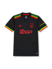 front view of Ajax 2021-22 Bob Marley tribute shirt with black base, red yellow and green sleeve detailing, Ajax crest, sponsor print, and Curaçao sleeve mark