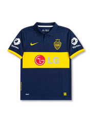 front view of Boca Juniors 2007 home shirt with navy body, yellow chest band, LG sponsor, Boca Juniors crest, Nike logo, and Total sleeve sponsors