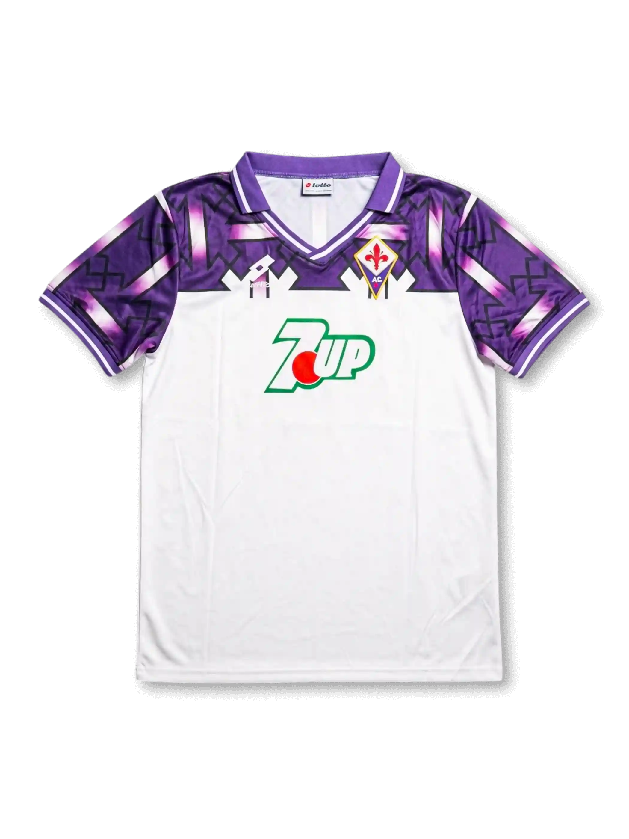 front view of Fiorentina 1992-93 away shirt with white body, purple shoulder graphics, 7UP sponsor, Lotto branding, and Fiorentina crest