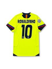 back view of Barcelona 2005-06 away shirt with fluorescent yellow body, navy trim, Champions League sleeve patch, and #10 Ronaldinho name and number print