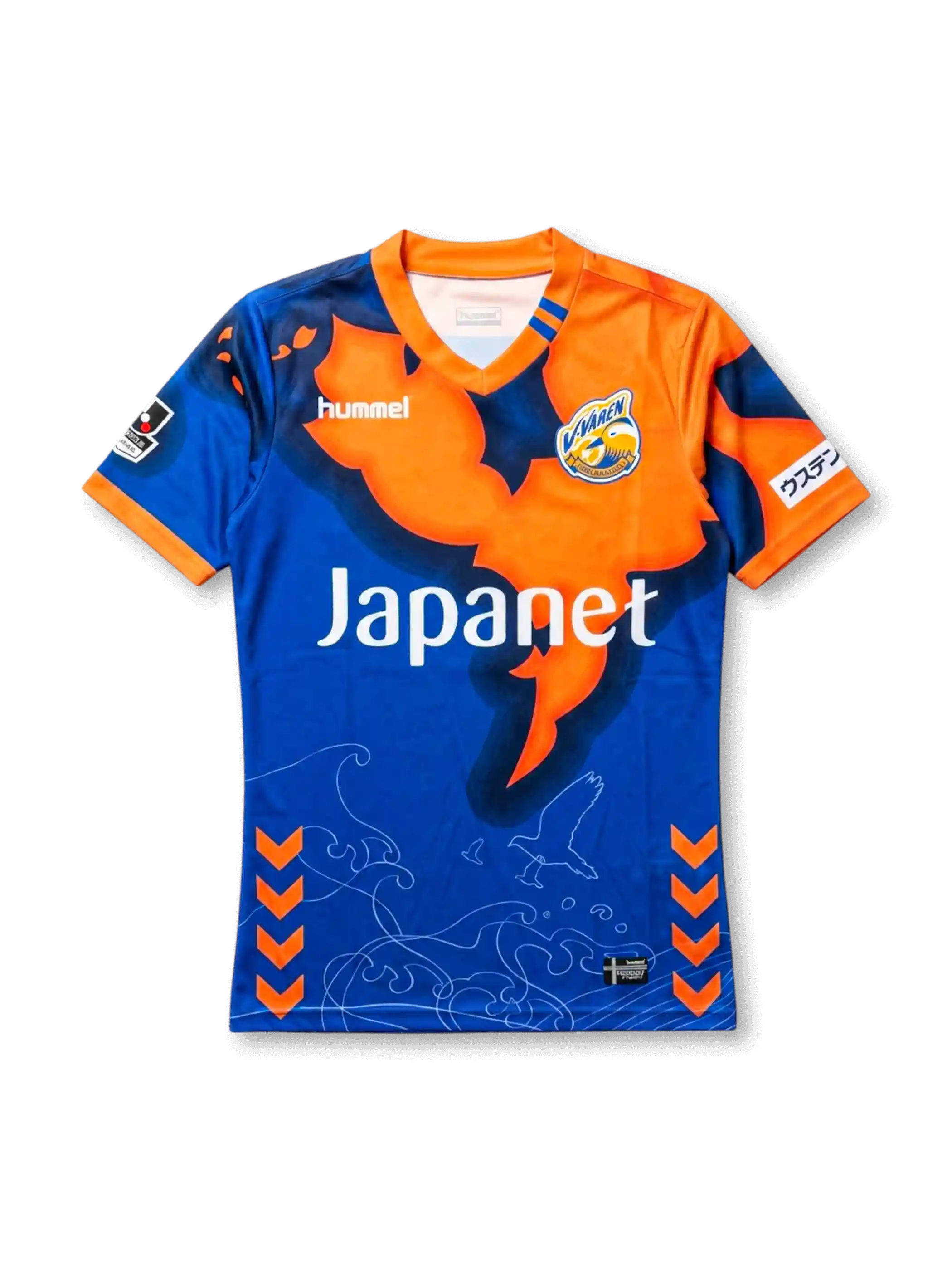 front view of V-Varen Nagasaki 2018 home shirt with blue and orange graphic design, V-neck collar, Hummel logo, club crest, Japanet sponsor, J.League sleeve patch, orange chevron accents, wave lines, and bird graphic details
